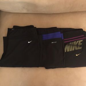 Three Nike stretch dri-fit active wear pants